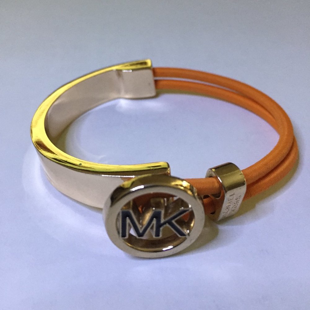 MICHAEL KORS GOLD TONE RED CORD BRACELET